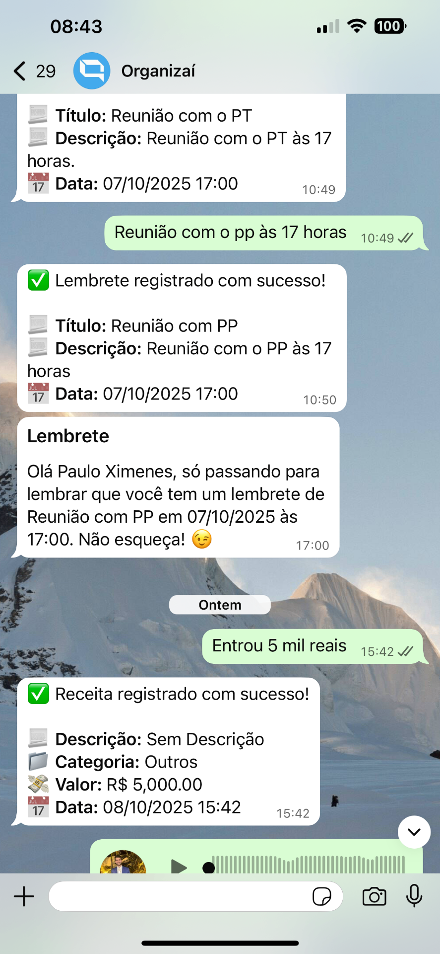 Conversa real com o OrganizAÍ no WhatsApp: lembrete de reunião e registro de receita de R$ 5.000